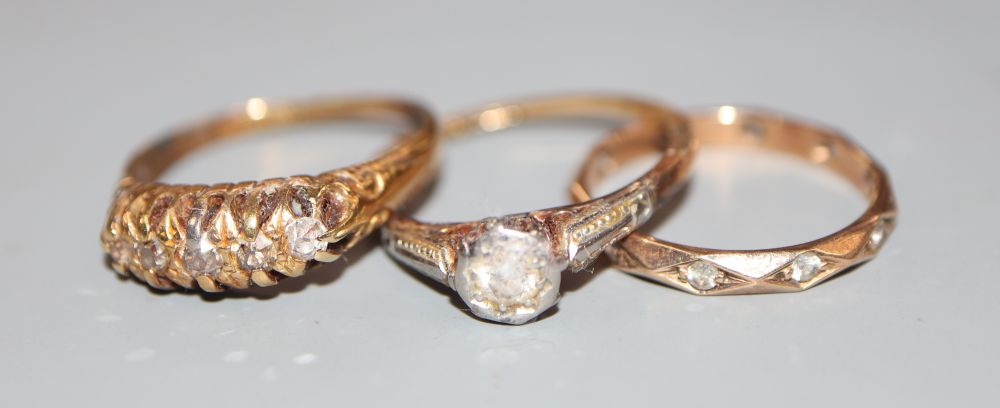 Two 18ct gold and diamond set rings, gross 5.7 grams and a 9ct ring, gross 1.6 grams.